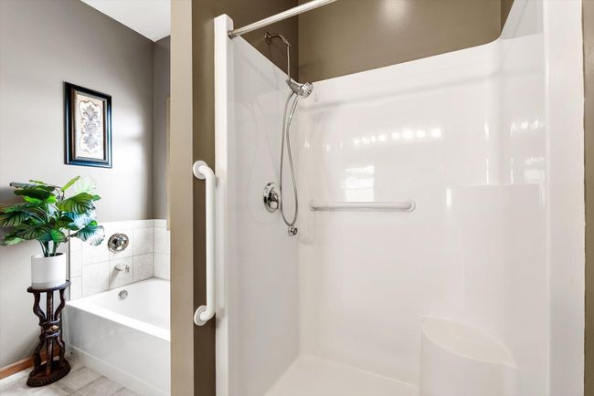 Enjoy the convenience of a separate walk-in shower and tub—designed for both comfort and functionality. | Image 30