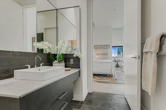 En-suite bathrooms offer privacy and comfort, with modern finishes and walk-in showers. | Image 26