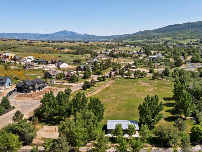 Aerial view of residential area with a mountain backdrop | Image 61