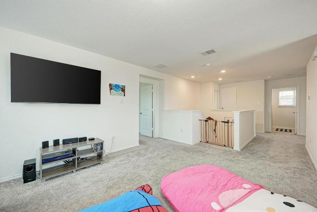 Living room with light carpet and recessed lighting | Image 23