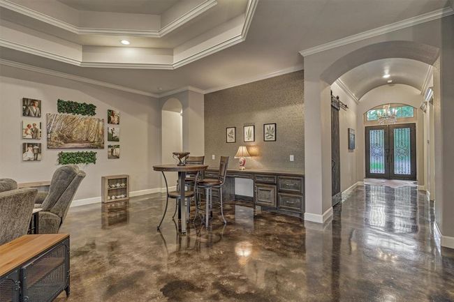 Just a few steps from the entry foyer, the dining area embraces an open-concept design, making it perfect for entertaining guests or enjoying quality time with family in a connected, welcoming space. | Image 18