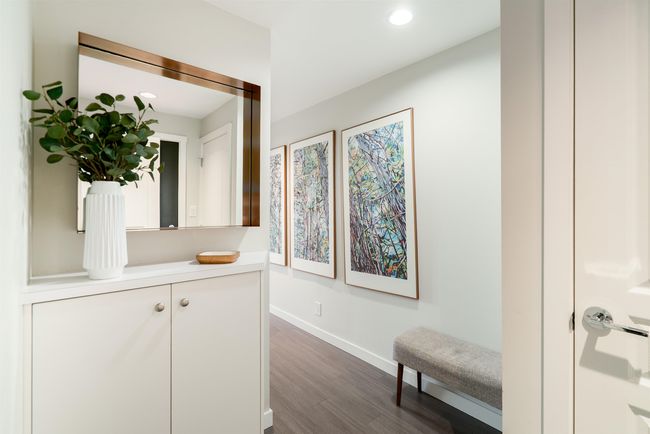 Hallway with dark wood-style floors, baseboards, and recessed lighting | Image 23