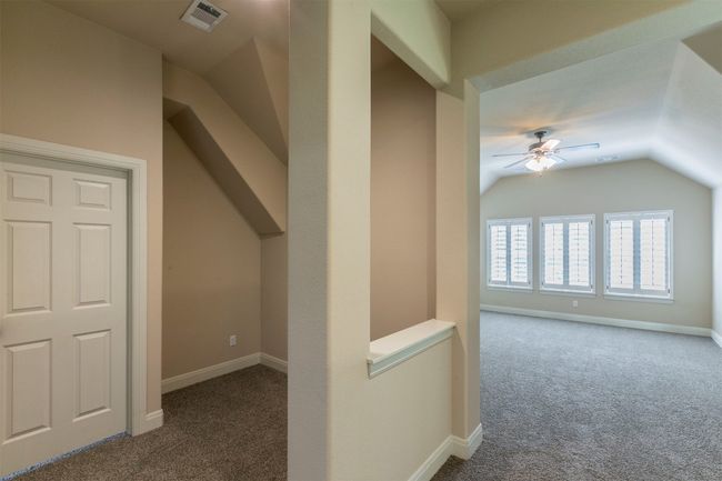 Between the secondary bedrooms and the bonus space, there is a nook perfect for a secondary office or study space | Image 33