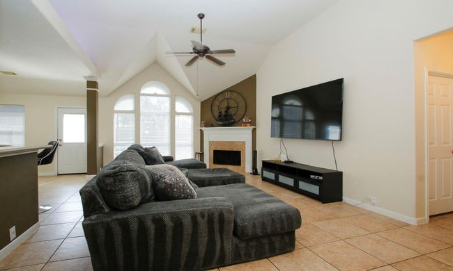 Family room is open to the kitchen and a large space for family gatherings. | Image 7