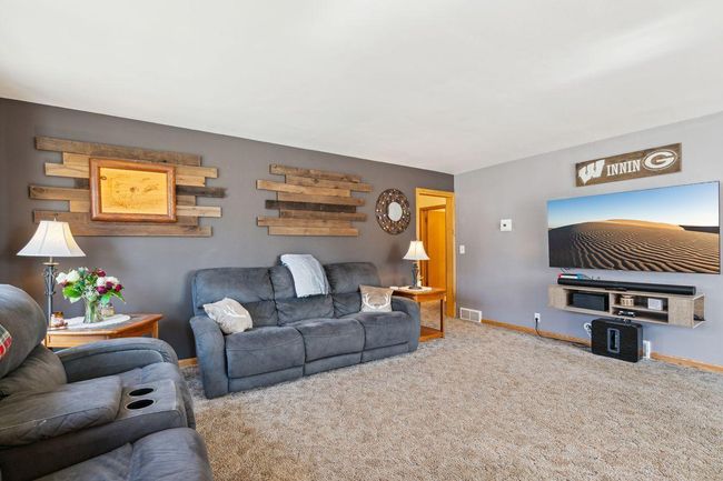 Living room (hardwood floors underneath the carpet!) | Image 8