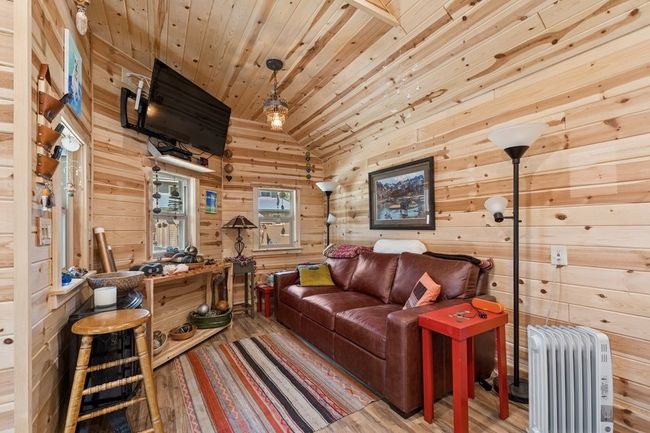Cozy interior of crafting shed. Includes a mini split for temperature regulation! | Image 18