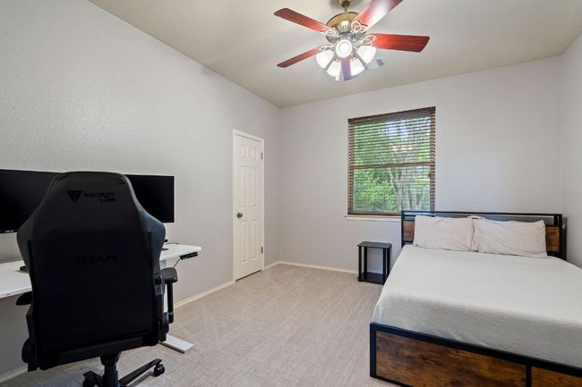 Bedroom with visible vents, baseboards, ceiling fan, and light colored​​‌​​​​‌​​‌‌​‌‌​​​‌‌​​‌‌​‌​​​​​‌ carpet | Image 30