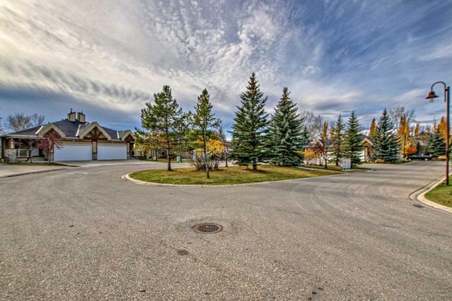 37 Rowland Lane, Home with 3 bedrooms, 2 bathrooms and 2 parking in Okotoks AB | Image 48