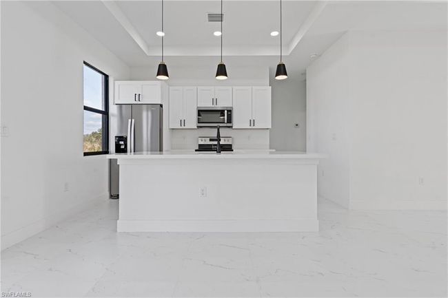 3129 71 St St W, House other with 3 bedrooms, 2 bathrooms and 2 parking in LEHIGH ACRES FL | Image 4