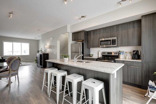 107 - 2802 Kings Heights Gate Se, Home with 3 bedrooms, 2 bathrooms and 2 parking in Airdrie AB | Image 10
