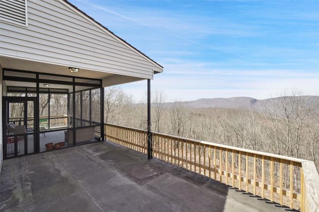 Wooden deck with a mountain view | Image 31