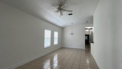 Living and dining area with tile floors | Image 3