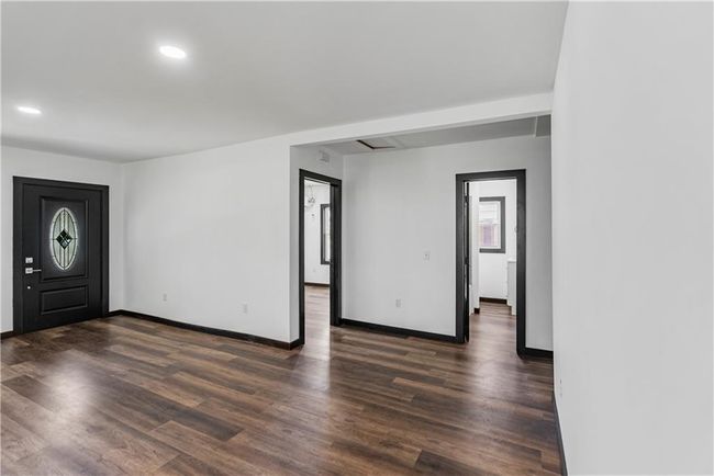 Foyer with baseboards, dark wood finished floors, and recessed lighting | Image 26