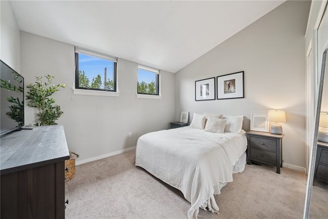 The primary bedroom is expansive. | Image 12