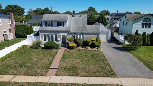 83 Cotton Ln, Levittown, NY, 11756-4923 | Card Image