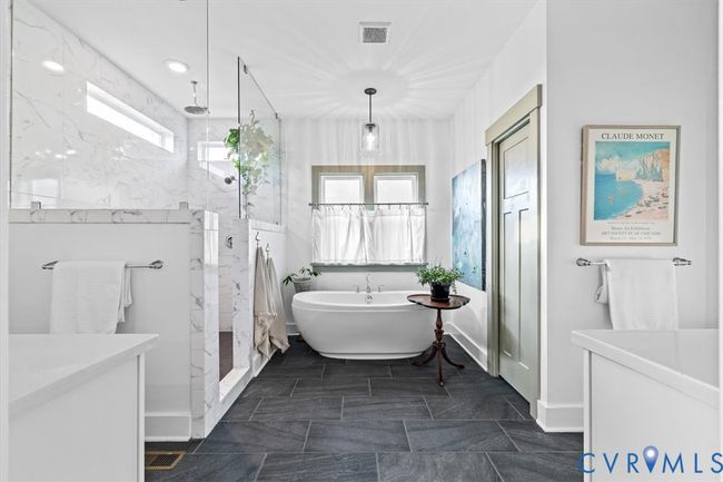 This is 1 of 2 primary bathrooms. This one is on the first floor. | Image 21