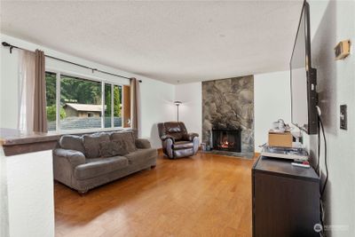 Living room with fireplace | Image 3