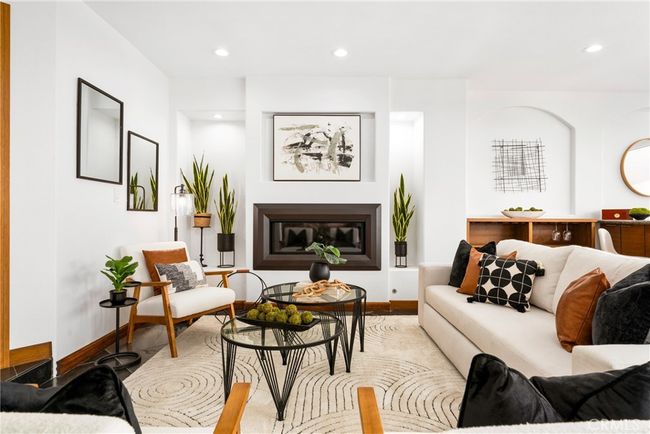 Comfortable living area with a fireplace! | Image 8