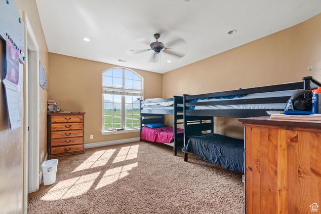 Bedroom featuring baseboards, recessed lighting, carpet flooring, visible vents, and ceiling fan | Image 41