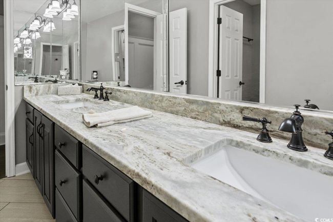 Full bath featuring vanity | Image 27