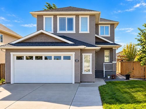 14 Thyrza Burkitt Pl N, House with 4 bedrooms, 4 bathrooms and 4 parking in Lethbridge AB | Card Image