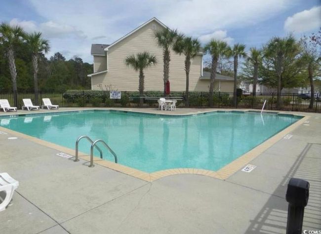 Pool featuring a patio and fence | Image 17