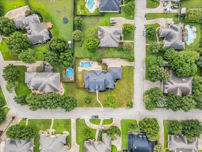 Aerial view of property's location with nearby suburban area | Image 25
