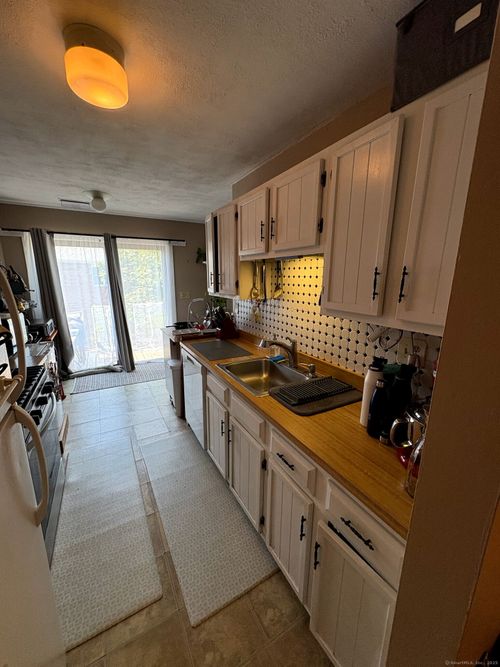 24-24 Southwind Ln, Milford, CT, 06460-7551 | Card Image