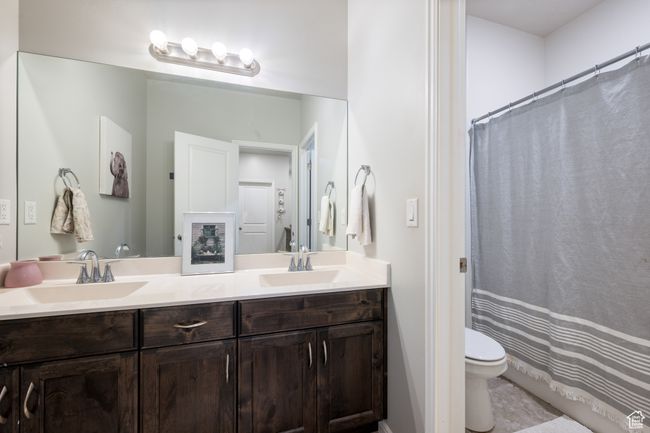 Full bath featuring double vanity | Image 26