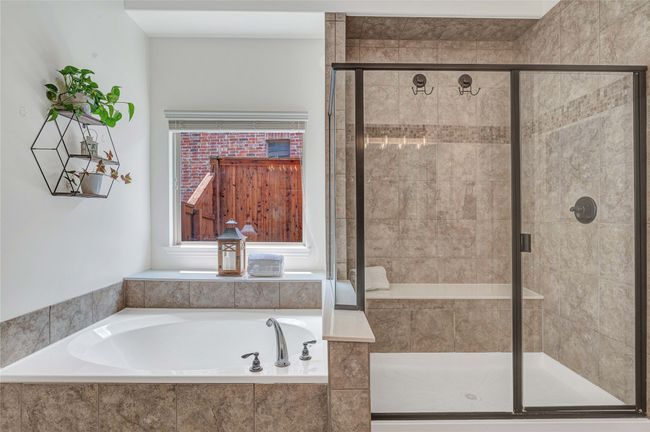Full bathroom with a garden tub and a shower stall | Image 25