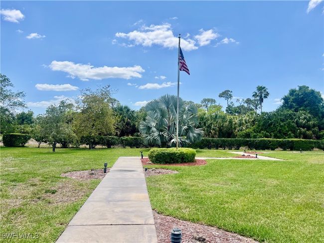 View of property's community with a yard | Image 27