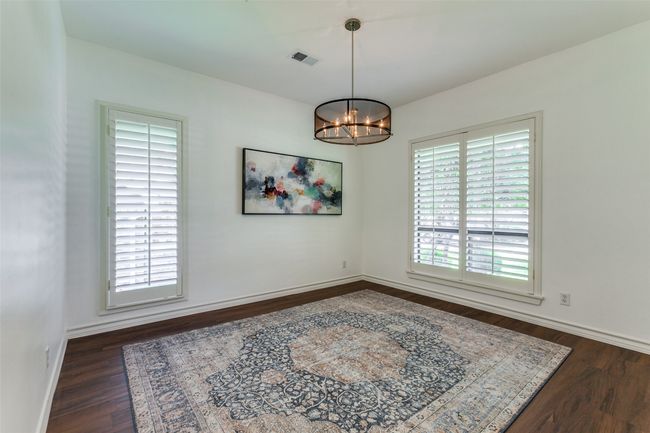 Imagine your beautiful dining set here, the room has plenty of room for a large dining table and a buffet. The gorgeous Kichler light will accent your spread and the large windows with southern light will always highlight this space! | Image 12