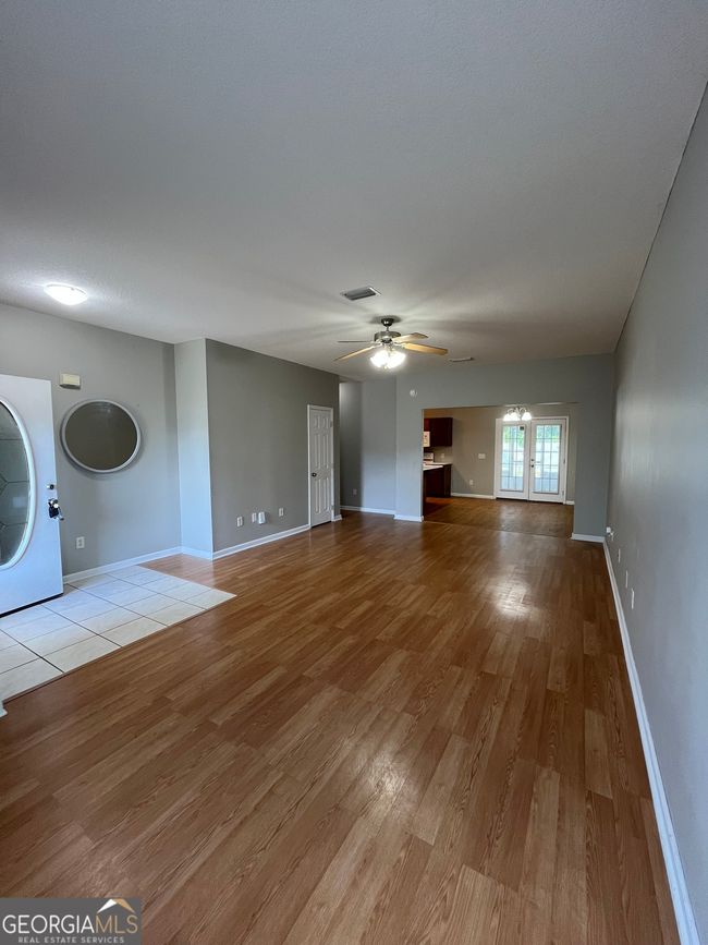 202 Royal Palms Ave, Home with 3 bedrooms, 2 bathrooms and null parking in Kingsland GA | Image 4
