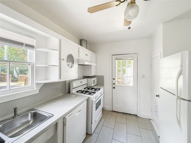 Kitchen (Refrigerator there for tenant use but not maintained by the landlord.) | Image 15