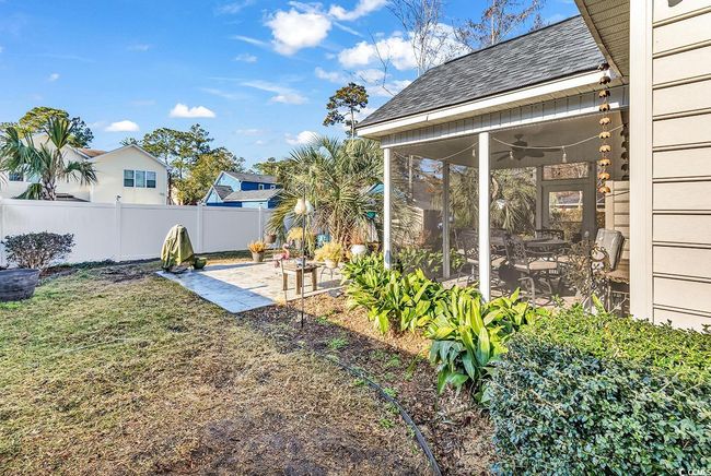 Sunroom featuring ceiling fan | Image 34