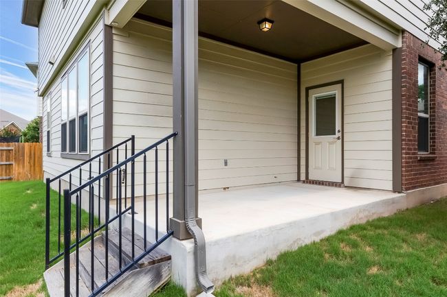 Property entrance with brick siding | Image 35