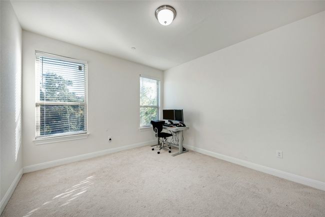 Unfurnished office featuring carpet floors and baseboards | Image 13