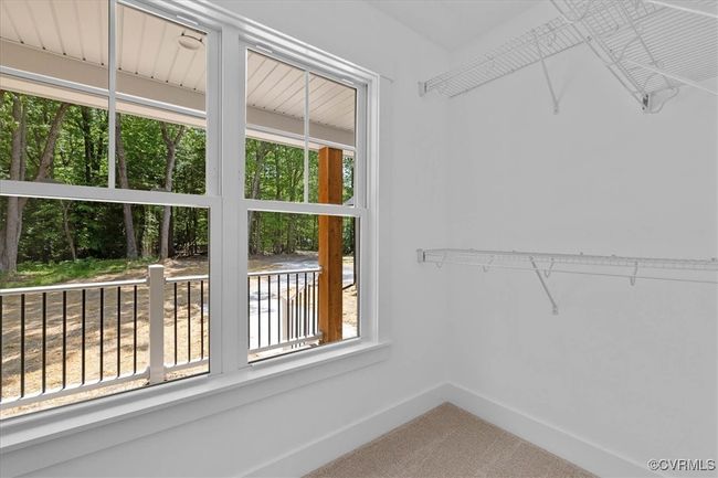 Spacious closet featuring carpet floors | Image 21