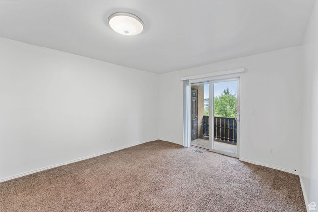 Bedroom 2 with balcony access | Image 12