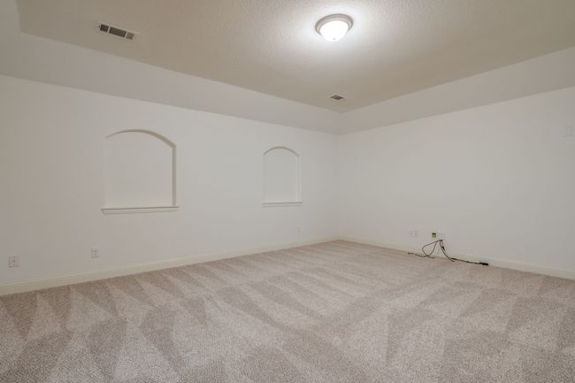 Carpeted spare room with baseboards and a textured ceiling | Image 17