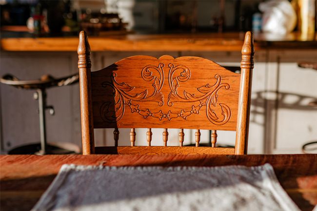 Chairs and benches surround the 14 foot handcrafted table. | Image 19