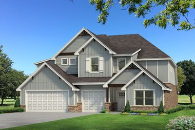 Craftsman inspired home with a garage and a front yard | Image 1