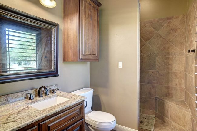 Downstairs private bathroom for guest/secondary bedroom. | Image 19