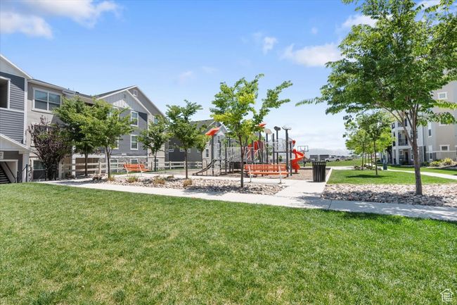 Community play area featuring a lawn | Image 19