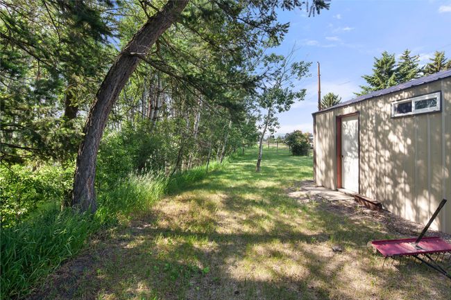 View of yard & garage | Image 63