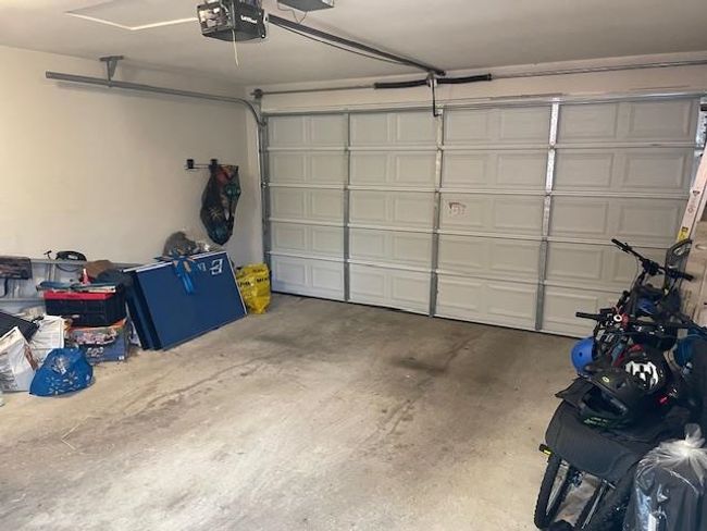 Garage featuring a garage door opener | Image 18