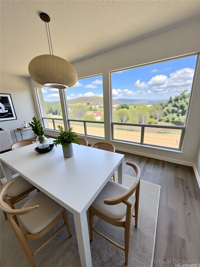 Enhanced A dining room that doubles as a relaxing reading corner with a great view | Image 4