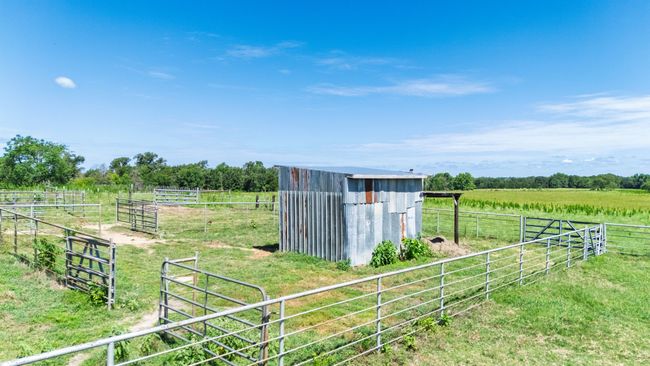 View of yard with a view of rural / pastoral area and an outdoor structure | Image 31