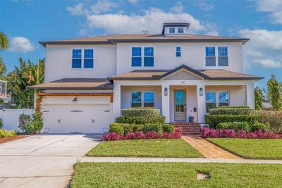 Front elevation of the home. Notice the original brick walk path and brick detail on front of the home. | Image 1