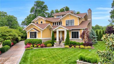 Gorgeous landscaping surrounds the entire property | Image 1